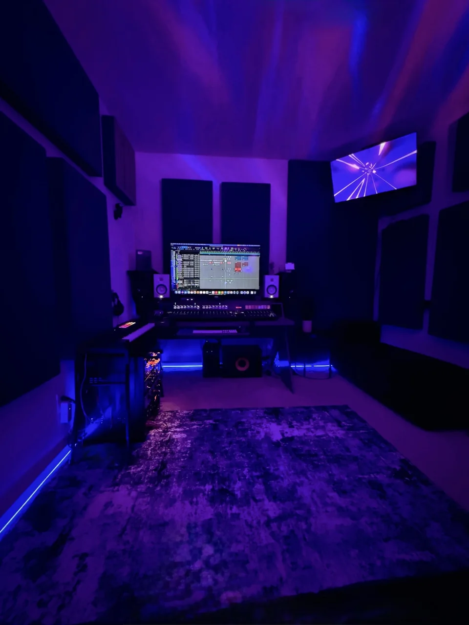 Lunar Mansion Studios control room front view with monitors, mixing console, and acoustic treatment